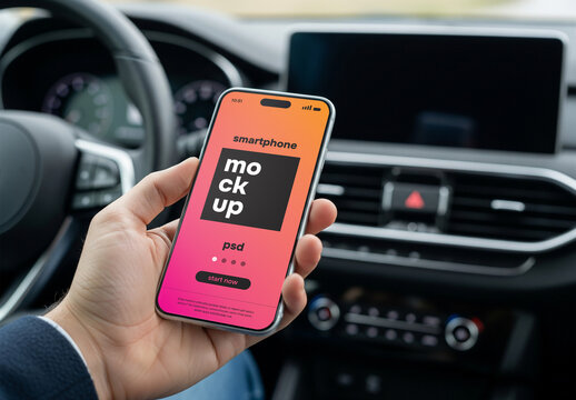 A person using a smartphone in a car