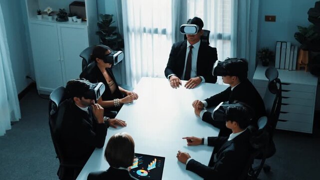 Top view of project manager working on laptop and sending data analysis to business people by using VR glass headset. Professional marketing team enter metadata or virtual world program. Directorate.