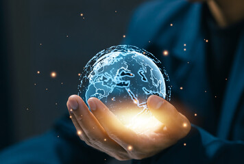 Business professional holding glowing digital globe, representing global connectivity, data network, international communication, digital transformation, and worldwide technology integration.