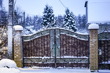 Wrought Iron Gate in Winter Snow