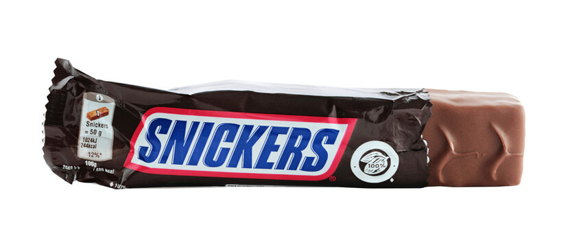Snickers chocolate bar in package, isolated on transparent background. Snickers is a chocolate bar made by the American company Mars Incorporated