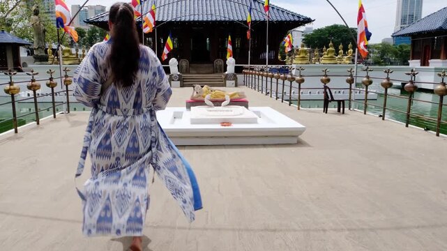 Visiting the Seema Malakaya Temple in Colombo, Sri Lanka. A Colombo tourist attraction, the temple is built on a lake in the city center.