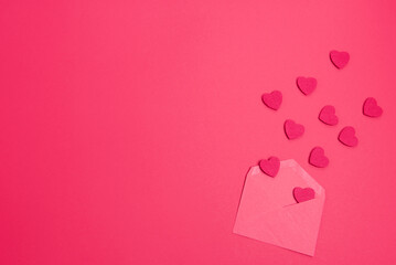 Beautiful and romantic valentines background with present and hearts in red for valentines day or anniversary holiday celebration with copy space