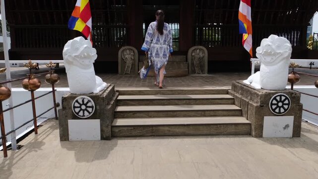 Visiting the Seema Malakaya Temple in Colombo, Sri Lanka. A Colombo tourist attraction, the temple is built on a lake in the city center.