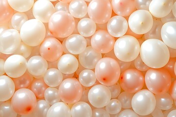 Bunch of light peach and cream balloons grouped together in air