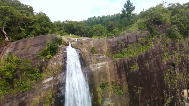 view of Diyaluma Falls in Sri Lanka. Diyaluma Falls is 220 meters high and is the second highest waterfall in Sri Lanka. It is a popular tourist destination on the island.