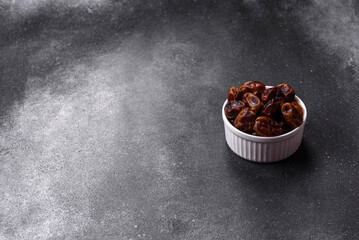 Dried sweet dates, natural tropical fruits for a healthy diet. Dried dates