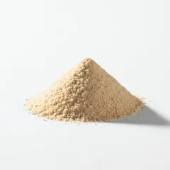 Fine Granulated Garlic or Onion Powder Heap Isolated on White © JuliusGideon