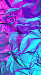 Crumpled iridescent foil in shades of purple and blue, perfect for backgrounds, design elements, and creative projects. Shiny, textured, colorful.
