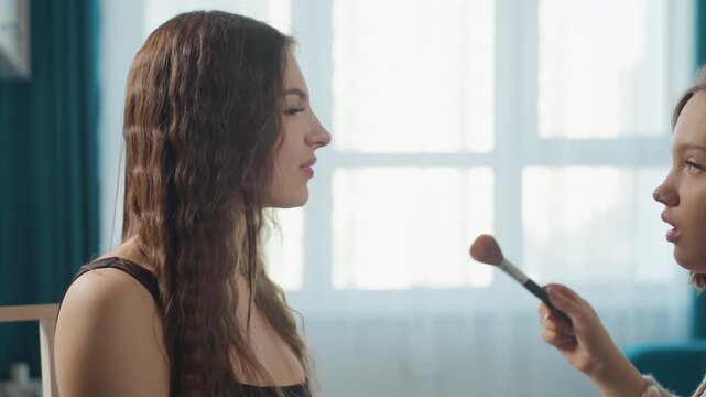 Serene Woman Carefully Brushing Hair Prior To Camera Test And Makeup Application, Tranquil Female Preparing Her Hair For Upcoming Portrait Sitting With Gentle Natural Lighting And Grooming