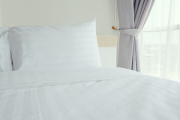 Comfortable soft pillows on the bed in hotel