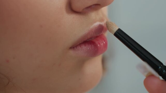 Soft Lighting Highlights Refined Cosmetic Blending Process, Closeup Of Model With Seamless Concealment Around Lips, Expertly Blended Makeup On Model Illuminated By Gentle Studio Lighting