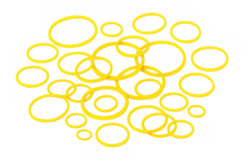 Yellow rubber bands scattered in various sizes, symbolizing flexibility, organization, and office supplies with a transparent background