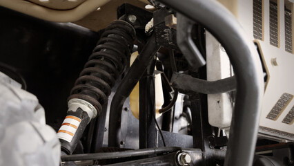 Old car suspensions. Close up car suspension wear and tear parts. CV joint Rubber boot and Control arms bushing Steering rack axles Shock absorber Brake exhaust. Gas Diesel car service repair parts.