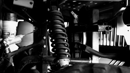 Old car suspensions. Close up car suspension wear and tear parts. CV joint Rubber boot and Control arms bushing Steering rack axles Shock absorber Brake exhaust. Gas Diesel car service repair parts.