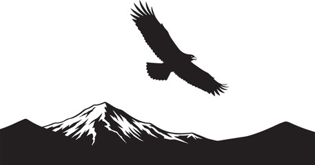 Majestic eagle soaring over a snow-capped mountain peak silhouette in the wilderness.