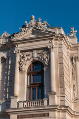 Architectural details of historic Vienna Burgtheater (Imperial Court Theatre) or &ldquo;K.K. Hofburgtheater&rdquo;, 1888. Sunset. VIENNA, AUSTRIA.