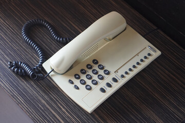  top view old black and white coin operated telephone on bedside table background, object, decor, fashion, ancient, antique, copy space
