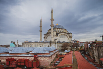 View of the rooftops of the Grand Bazaar with mosque in the background