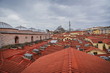 View of the rooftops of the Grand Bazaar with mosque in the background
