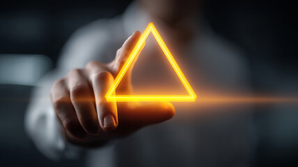 A glowing triangular warning symbol touched by a human finger, representing risk awareness, alert recognition and strategic caution.
