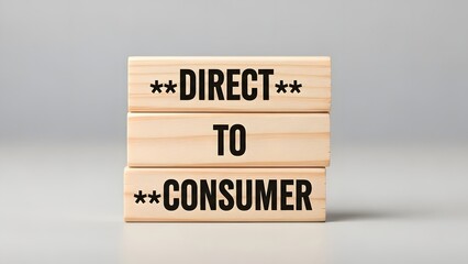 Naklejka premium Wooden blocks arranged to show direct to consumer concept
