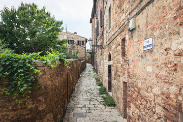 Via delle Romite, cobbled street in the old town of Colle di Val d'Elsa, province of Siena, Tuscany, Italy