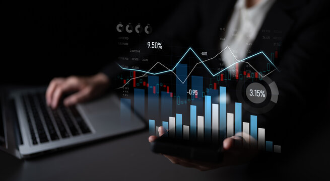 Business professional performs financial analysis through laptop and smartphone, showcasing insightful graphs and statistics in a professional setting. Scalp - Powered by Adobe