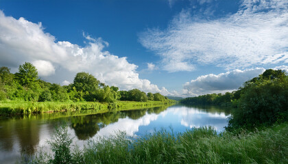 Serene Landscape Featuring A Tranquil River Reflecting Soft Clouds And Lush Greenery Creating A Peaceful Atmosphere In Nature S Embrace Ideal For Relaxation And Contemplation