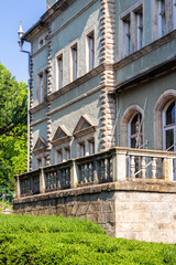 chynadiievo, transcarpathia, ukraine - 28 jul, 2013: schonborn royal palace under blue sky. heritage site in carpathians. popular tourist destination. hunting castle now a sanatorium on sunny day