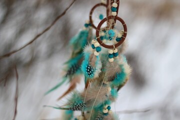 Dream catcher in winter outdoor season snow mascot bohemian style ethnic object hanging on the tree nature cozy calm photo beautiful background lifestyle thing boho lovely craft dreamcatcher