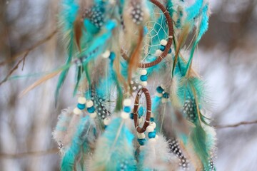 Dream catcher in winter outdoor season snow mascot bohemian style ethnic object hanging on the tree nature cozy calm photo beautiful background lifestyle thing boho lovely craft dreamcatcher