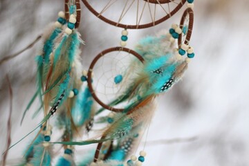 Dream catcher in winter outdoor season snow mascot bohemian style ethnic object hanging on the tree nature cozy calm photo beautiful background lifestyle thing boho lovely craft dreamcatcher