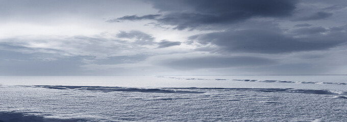 An empty snowy landscape, a plain of snow, a landscape.
