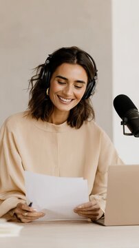 Woman Recording Podcast with Headphones and Script