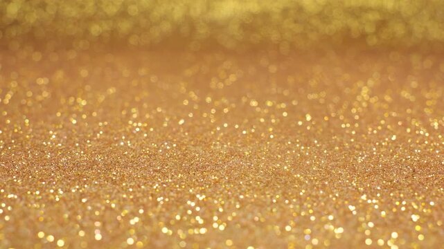 Gold texture with shiny glittering stars Real Footage, glowing beauty and cosmetics pattern motion design element 