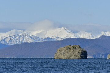 The nature of the Kamchatka Peninsula combines mountainous landscapes and forested areas, and is characterized by its unique topography, flora, and fauna, as well as its climate.