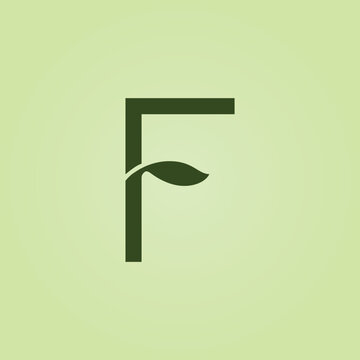 Lettre F verte stylis&eacute;e avec feuille int&eacute;gr&eacute;e en monogramme typographique minimaliste sur fond vert clair