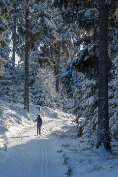 man walking in snow