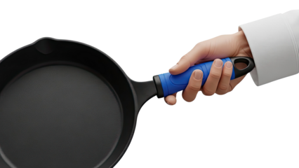 Hand holding a cast iron skillet with a blue handle