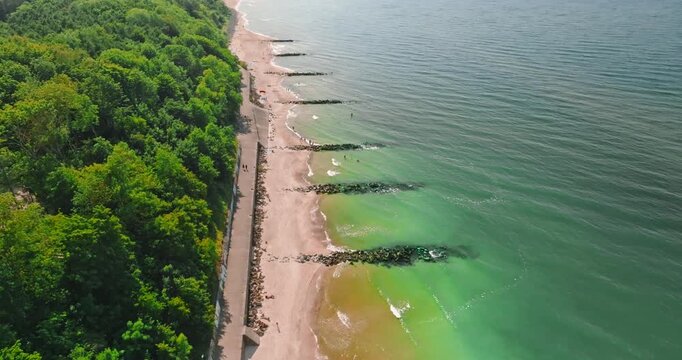 Beach with few people at Baltic Sea in summer.