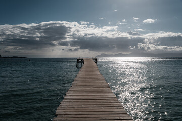 Fototapeta premium Wooden Pier Leading into Calm Sea