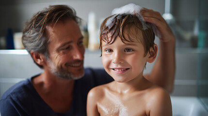 Joyful faceless boy and father enjoying bath time together sharing smiles family hygiene parent child bonding playful moment defocused background with copy space