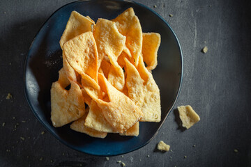 Golden and sweet angel wings with powdered sugar.