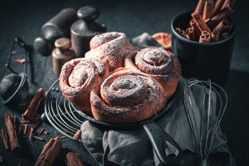 Delicious cinnamon buns with cocoa and sugar. Popular Swedish dessert.