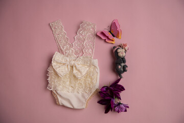 Newborn clothes with toys and flowers in a beautifully folded position for a photo © VideofotKA