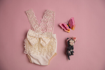 Newborn clothes with toys and flowers in a beautifully folded position for a photo © VideofotKA