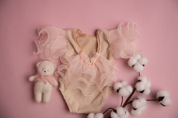 Newborn clothes with toys and flowers in a beautifully folded position for a photo © VideofotKA