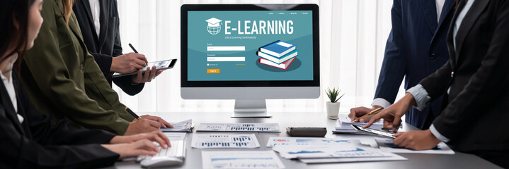 Panorama shot analyst team utilizing BI Fintech to analyze financial report with laptop. Businesspeople analyzing BI data dashboard displayed on laptop screen for business insight. Prodigy