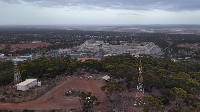 Norseman, Western Australia &ndash; 4K Aerial Drone Footage of Mining Site, Residential Houses and Estates, Lake, Forest and Remote Australian Outback Landscape at Sunrise 